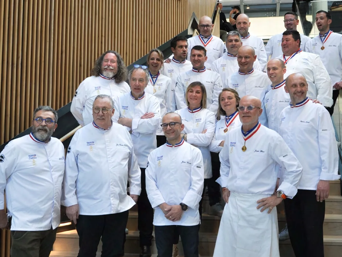 Les membres du jury, Meilleurs Ouvriers de France, réunis dans l'escalier de la Cité de la Gastronomie